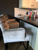 Luxe barstoel met armleuningen en capitons